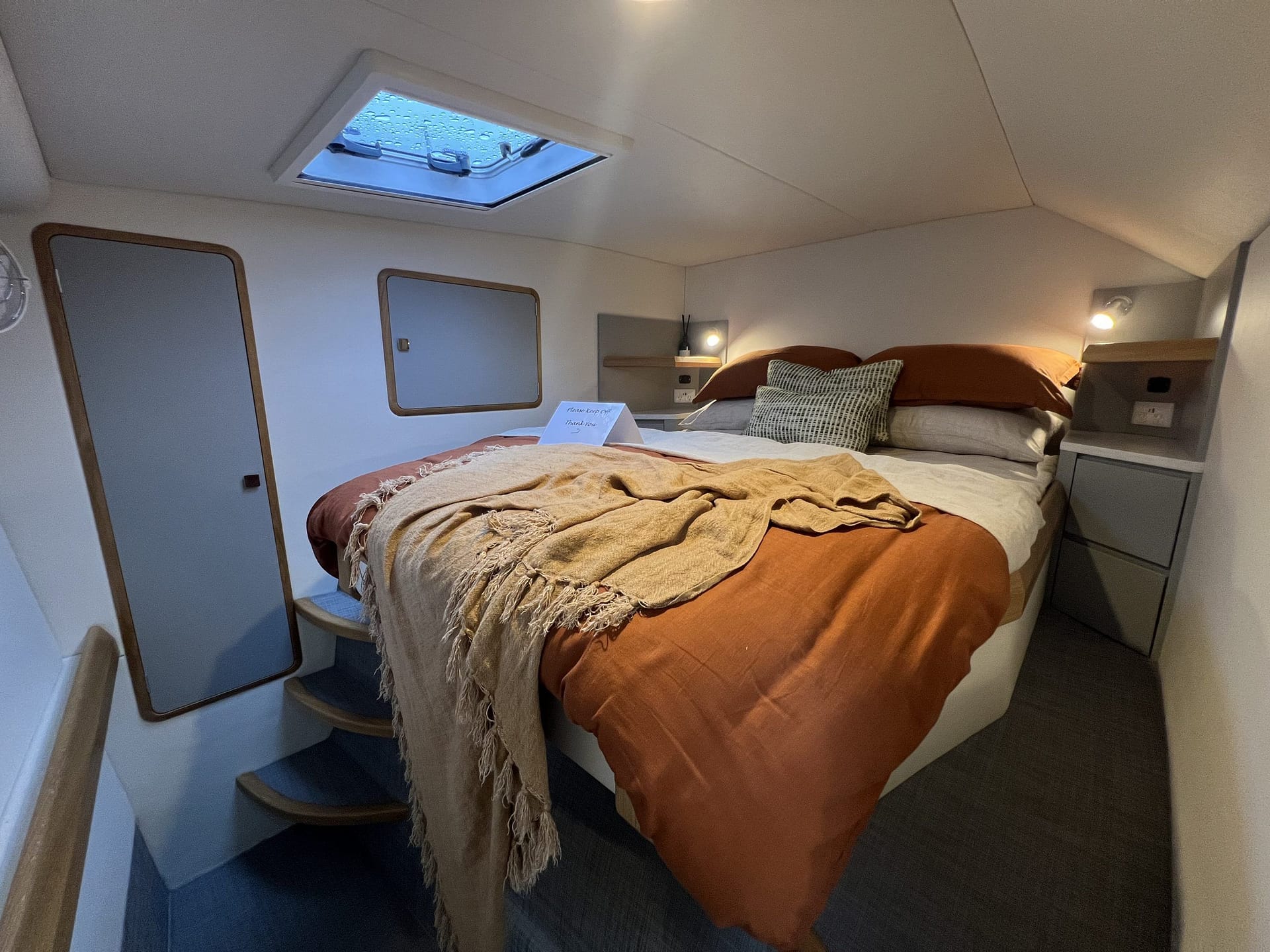 master cabin with queen-sized bed
