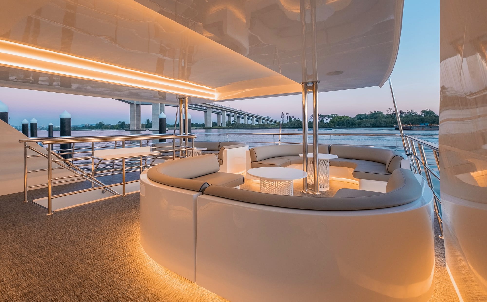 luxury boat interior with lighting under the seats with view of the river